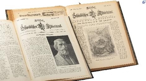 Zwei Ausgaben der "Blätter des Schwäbischen Albvereins". Links mit einem Foto einer Büste von Valentin Salzmann. Rechts ein abgedrucktes Aquarell eines Albausflugs.